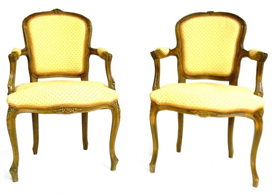 Appraisal: Pair arm chairs French style with carved frames floral and