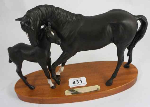 Appraisal: Royal Doulton Black Beauty and Foal on Wooden Plinth