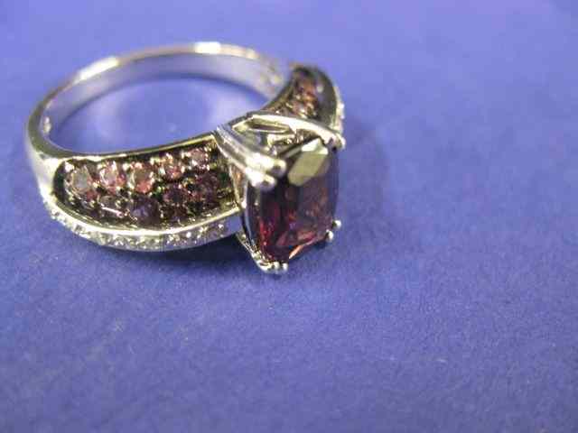 Appraisal: Garnet Diamond Ring rich emerald cut gem with garnets and