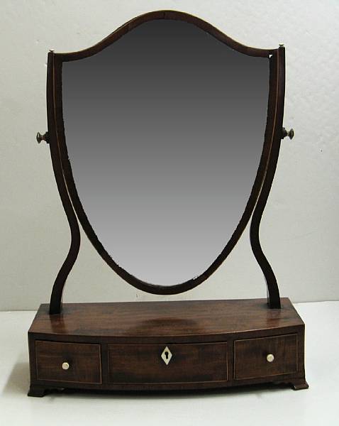 Appraisal: A George III mahogany dressing mirror late th century The