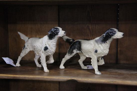 Appraisal: TWO CAST IRON HUNTING DOG DOOR STOPS American twentieth century