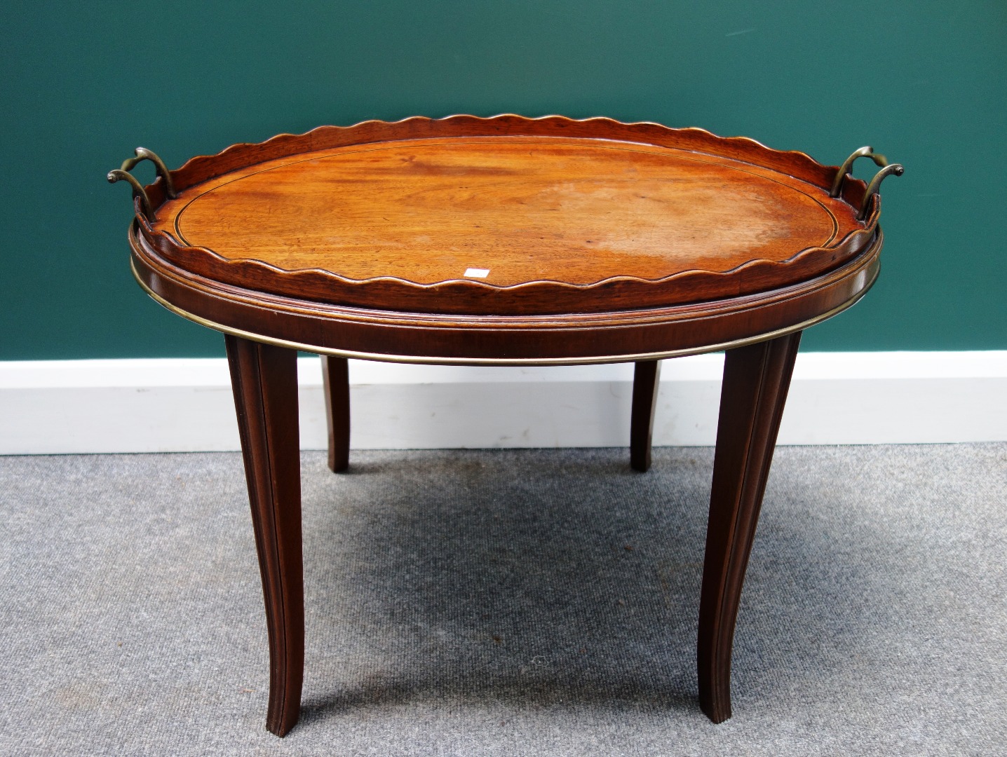 Appraisal: A George III inlaid mahogany galleried oval serving tray on