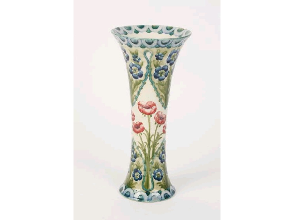 Appraisal: A TALL MACINTYRE TRUMPED-SHAPED VASE decorated in a Florian pattern