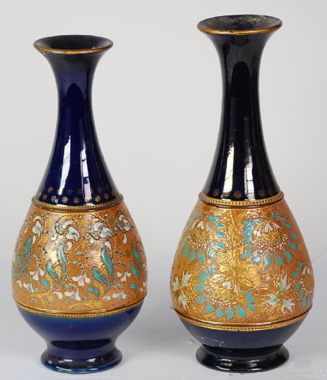 Appraisal: PAIR OF ROYAL DOULTON SLATER'S PATENT POTTERY VASES footed baluster