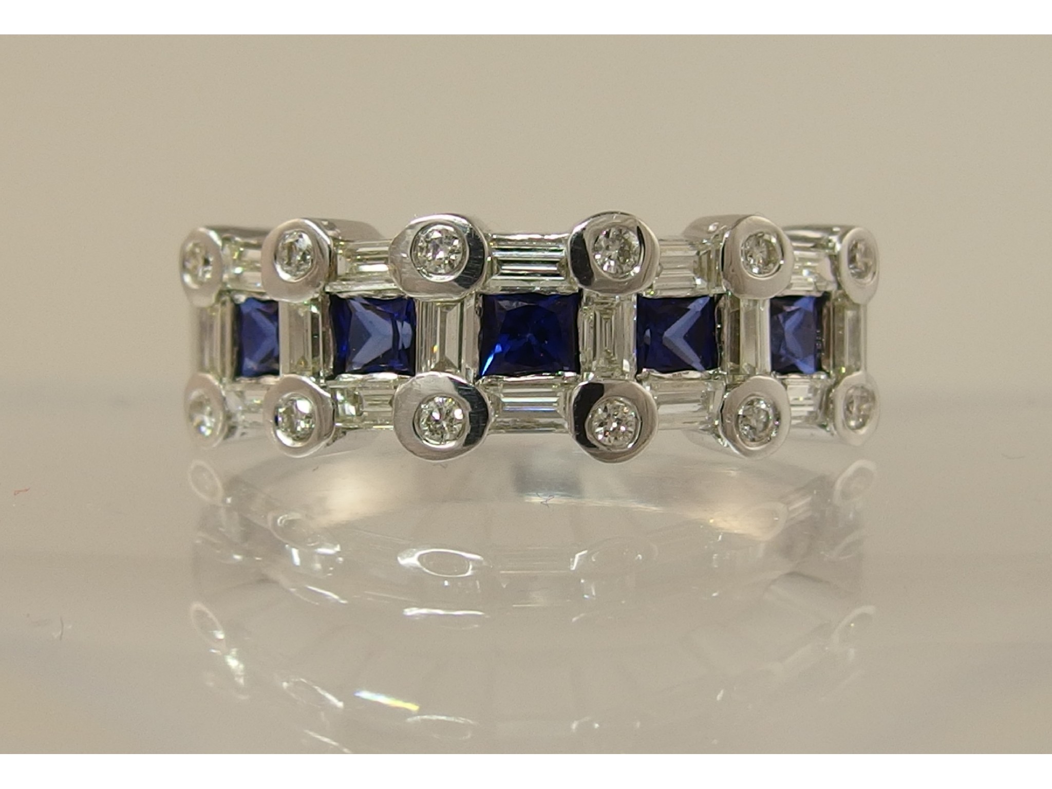 Appraisal: An ct white gold diamond and blue gem stone dress