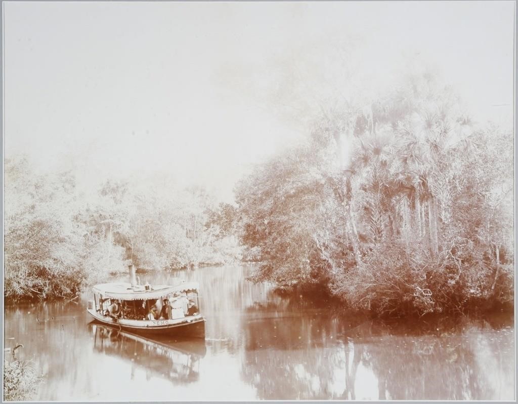 Appraisal: Sepia tone enlargement photograph of a steam-powered tour riverboat named