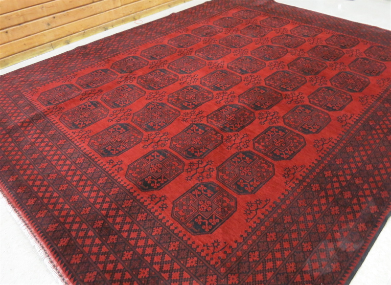 Appraisal: HAND KNOTTED ORIENTAL CARPET Afghan Ersari tribal the red field