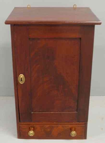 Appraisal: English mahogany wall cabinet mid th c with a slotted