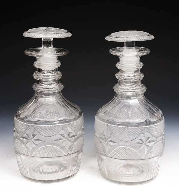 Appraisal: A pair of Regency cut glass decanters and stoppers cm