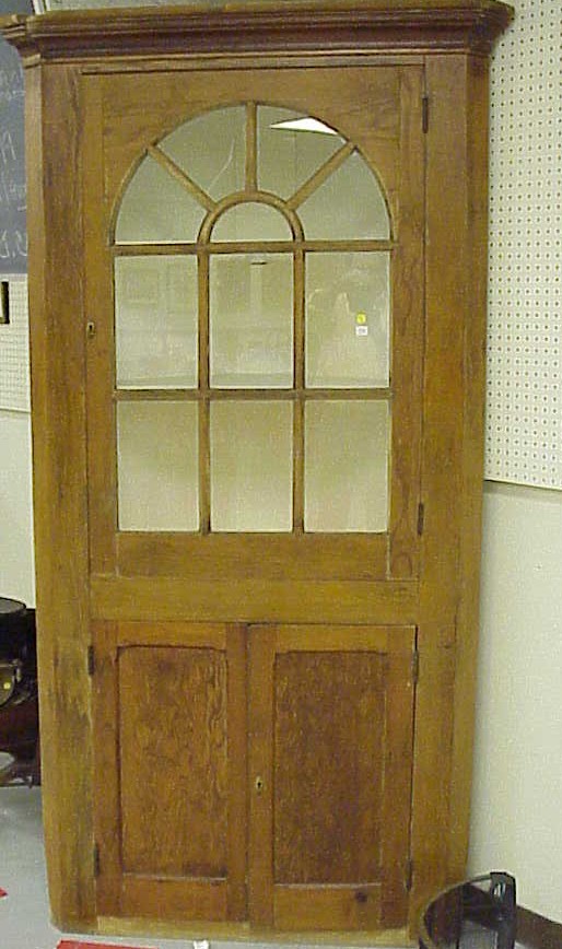 Appraisal: Pine corner cabinet with cove molding at the top an