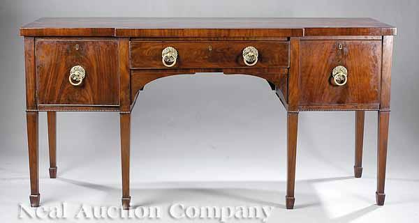 Appraisal: A Late Regency Mahogany Sideboard c the banded top above