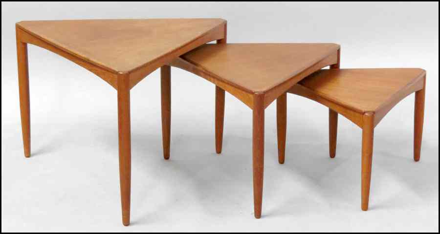 Appraisal: NEST OF THREE DANISH TEAK TRIANGULAR TABLES Largest H ''