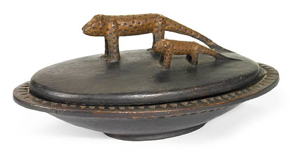 Appraisal: An East African lidded box with two carved feline animals