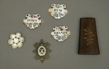 Appraisal: Three Enamel Bottle Labels Together with a sewing case and