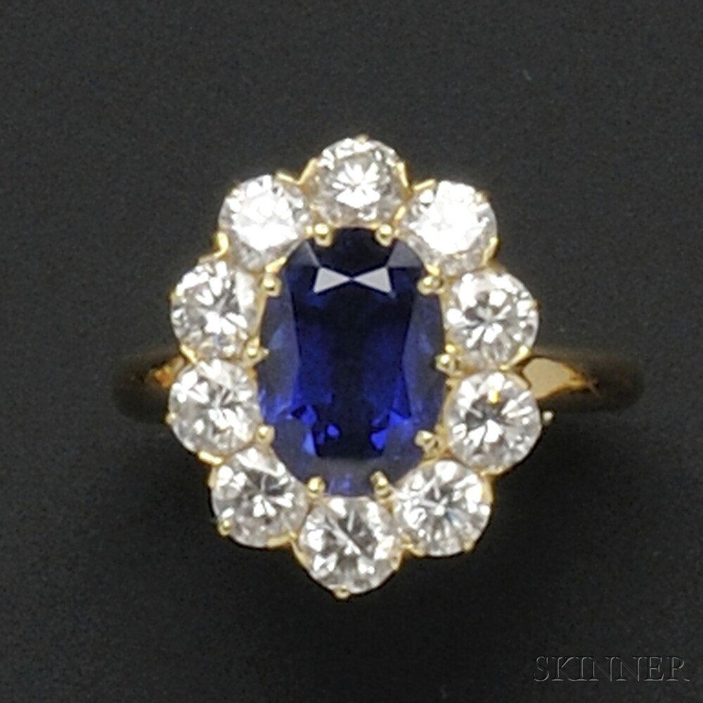 Appraisal: kt Gold Sapphire and Diamond Ring prong-set with an oval-cut