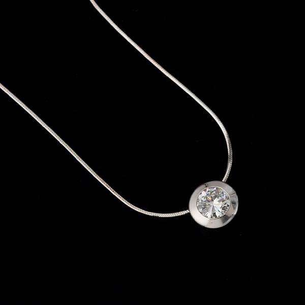 Appraisal: A diamond pendant centering a round brilliant-cut diamond weighing an