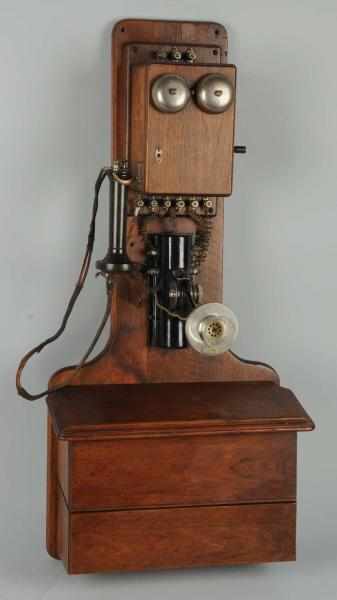 Appraisal: Western Electric -Jug Wall Telephone Circa walnut latest patent on