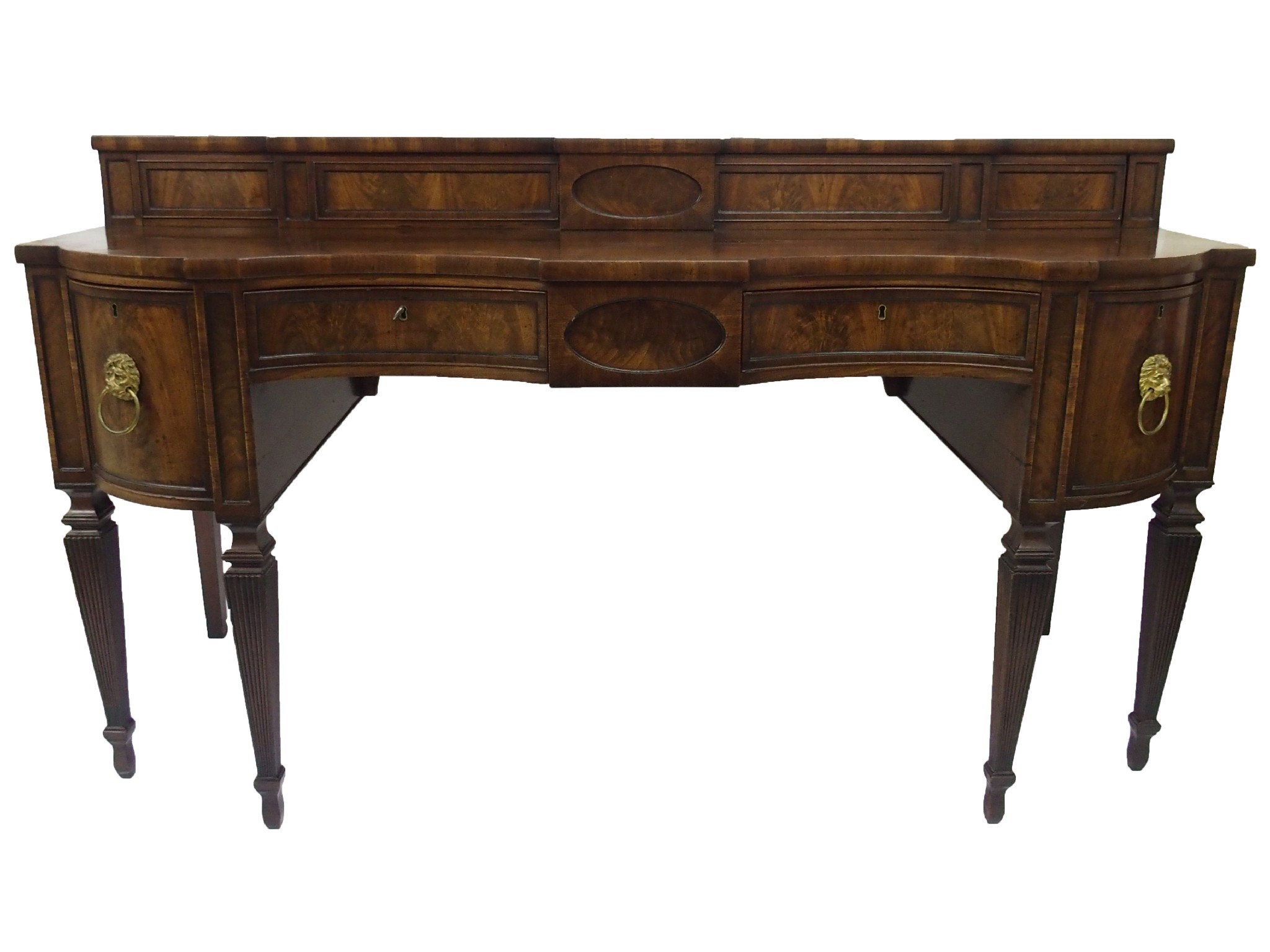 Appraisal: A George IV mahogany serpentine sideboardthe superstructure with sliding doors