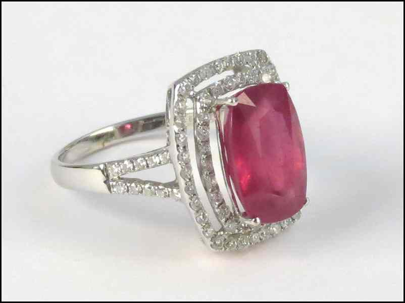 Appraisal: KARAT WHITE GOLD DIAMOND AND RUBY RING Ruby composite Diamonds