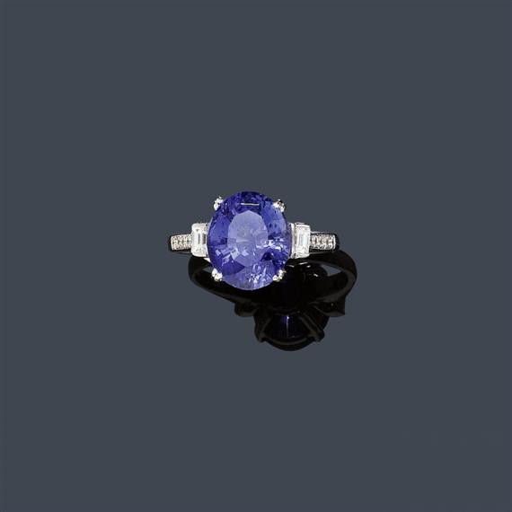 Appraisal: COLOUR CHANGE SAPPHIRE AND DIAMOND RING White gold Classic-elegant ring