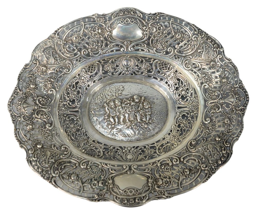 Appraisal: Continental Silver Reticulated Bowl having embossed center Putti with instruments