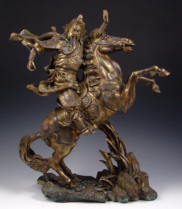 Appraisal: DECORATIVE CHINESE BRONZE STATUE OF GENERAL GUAN GONG on horseback