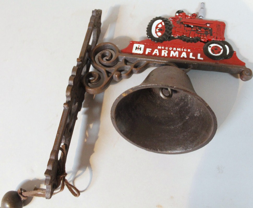 Appraisal: A modern Mccormick Farmall advertising tractor bell cm high