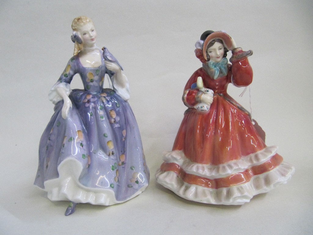 Appraisal: Two Royal Doulton figures Nicola HN and Christmas Time HN