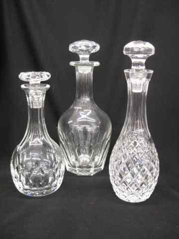 Appraisal: Cut Crystal Decanters man in cloak black is missing stopper