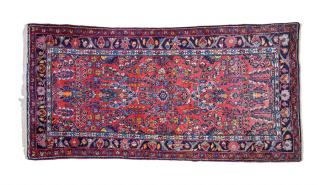 Appraisal: A SAROUK WOOL RUNNER th century The rug having allover