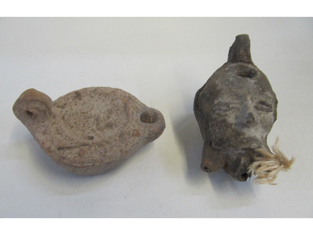 Appraisal: Lot comprising two Roman oil lamps