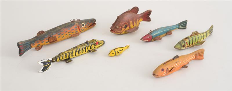 Appraisal: SEVEN CARVED AND PAINTED WOOD FISH With tin fins and