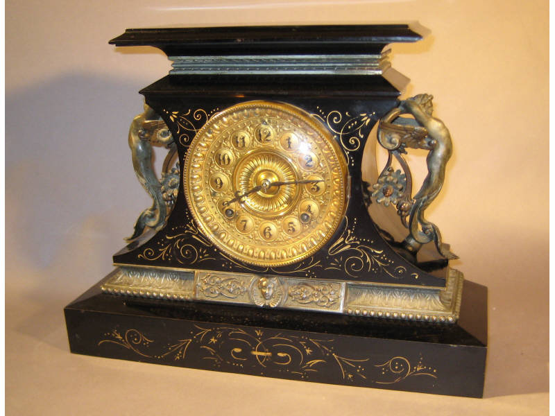 Appraisal: ANSONIA BLACK SLATE FIGURAL MANTEL CLOCK Flat top over the