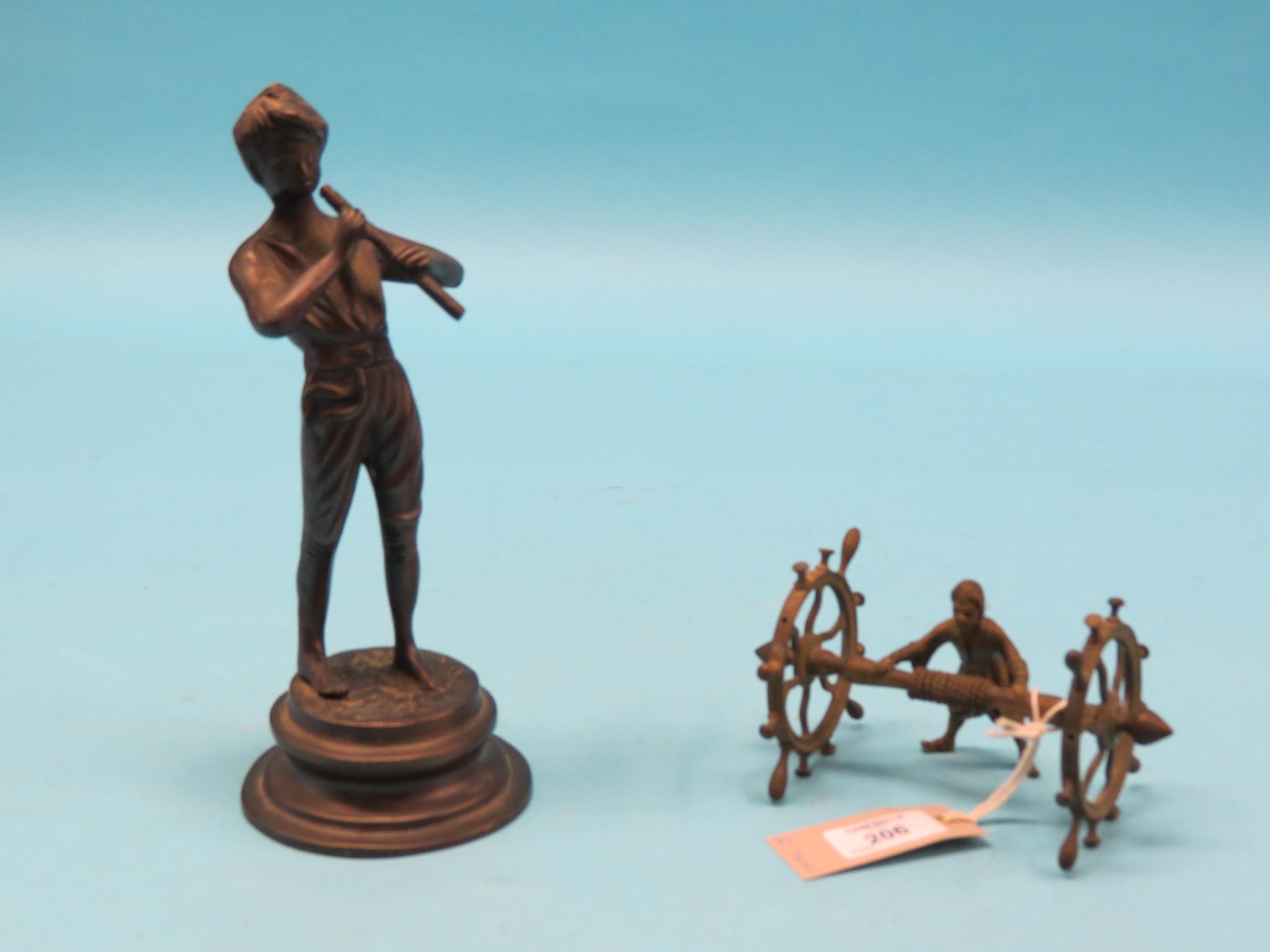 Appraisal: A cast brass model of an artisan at mill-work with