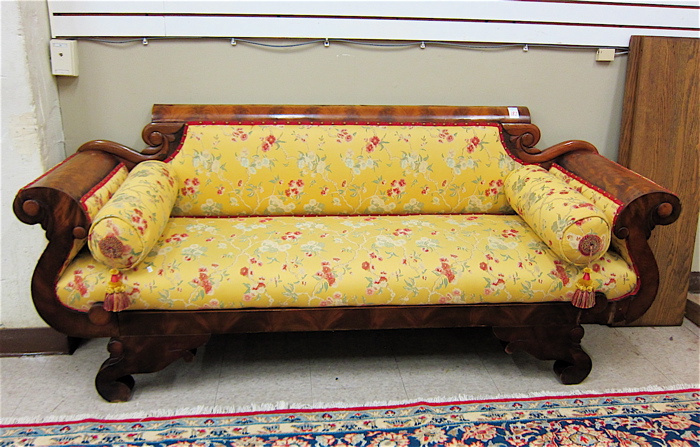 Appraisal: EMPIRE MAHOGANY SCROLL-ARM SOFA American c with recent floral print