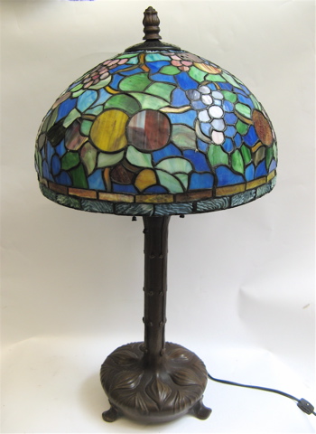 Appraisal: STAINED AND LEADED GLASS TABLE LAMP the shade in colorful