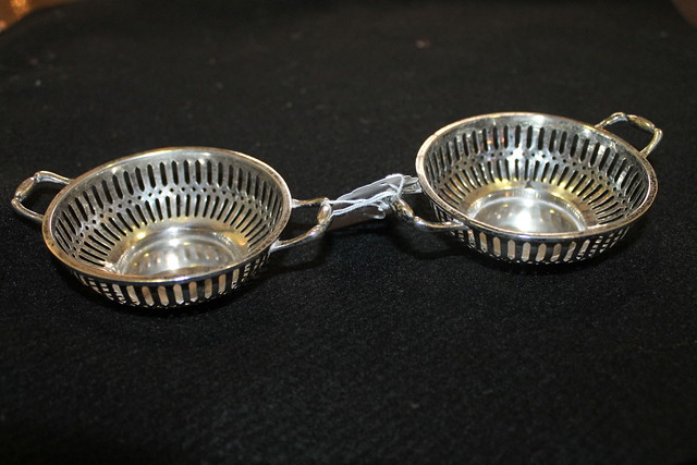 Appraisal: A PAIR OF SILVER BON BON DISHES of circular form