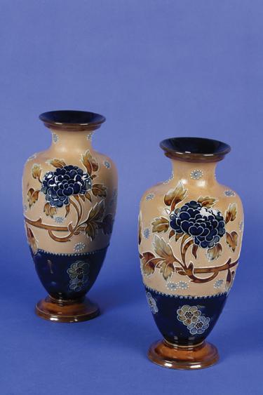 Appraisal: A PAIR OF ROYAL DOULTON VASES of baluster form decorated