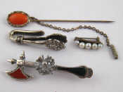 Appraisal: A mixed lot comprising a coral stick pin a brooch