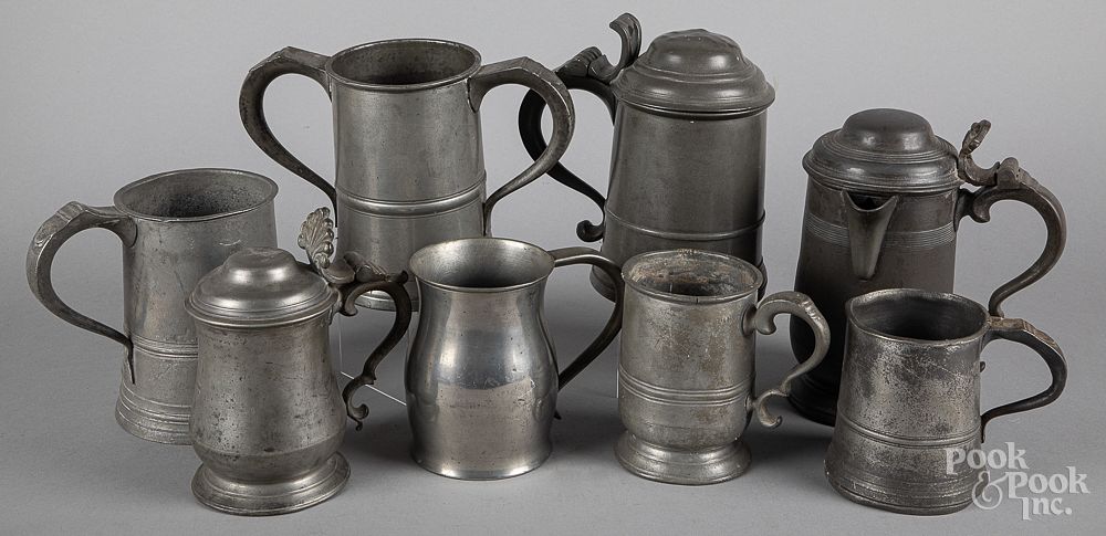 Appraisal: English pewter tankards and measures English pewter tankards and measures