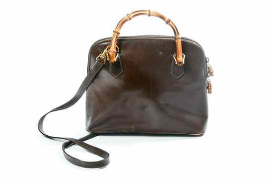 Appraisal: GUCCI BROWN LEATHER HANDBAG Contemporary Single compartment interior with zippered