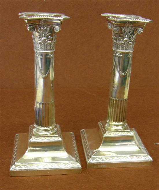 Appraisal: Pair of George V silver candlesticks in the form of