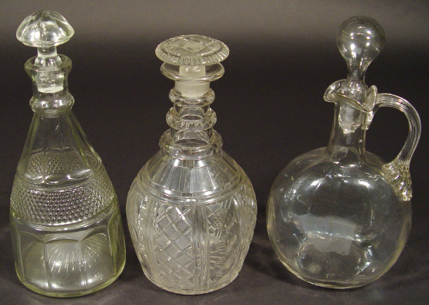 Appraisal: Three th century glass decanters and stoppers one with three