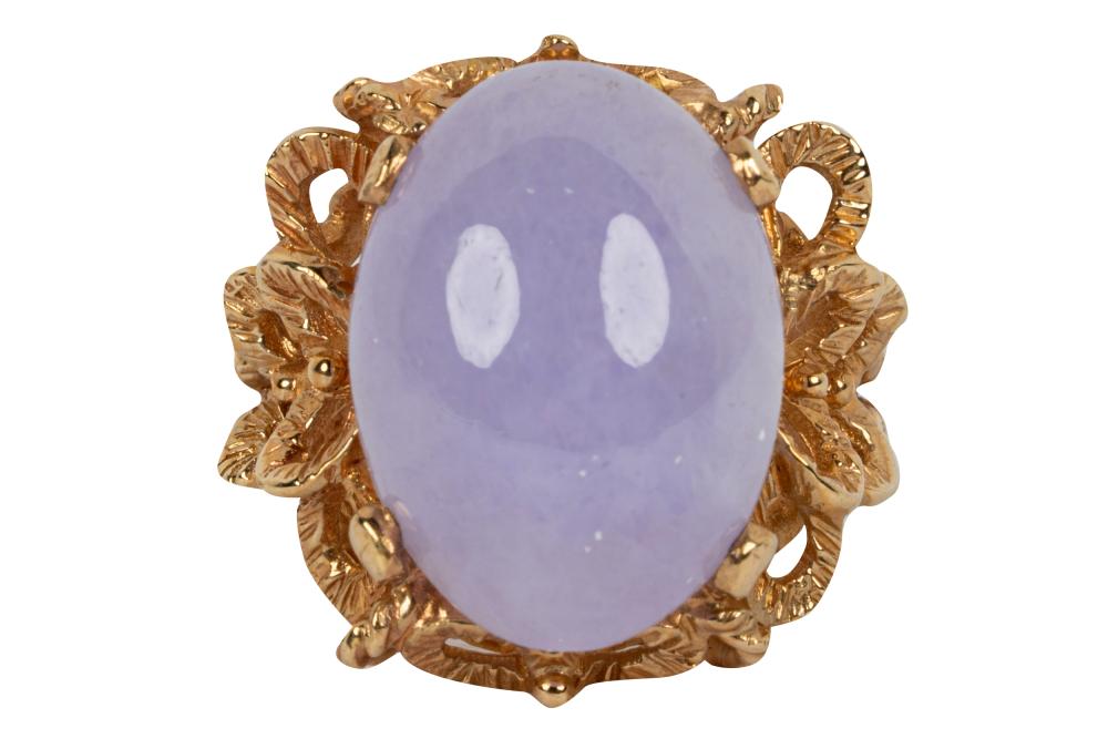 Appraisal: KARAT YELLOW GOLD LAVENDER JADE RINGcentering one oval cabochon cut