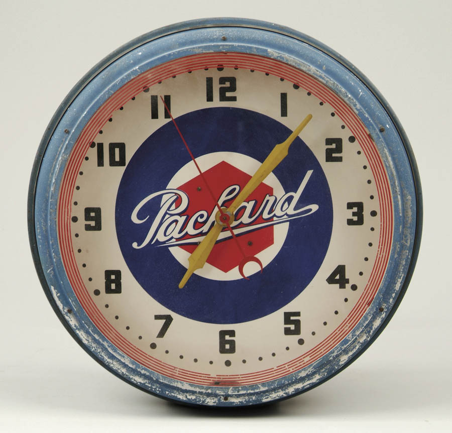 Appraisal: PACKARD NEON CLOCK Table top clock features a blue crinkle-paint