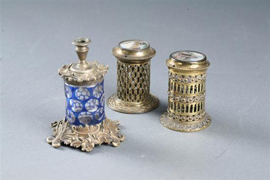 Appraisal: THREE MATCH HOLDERS English th century Two similar Going-to-bed lamps