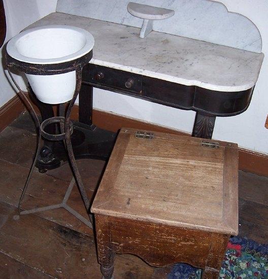 Appraisal: A late Victorian washstand the marble top with low splashback