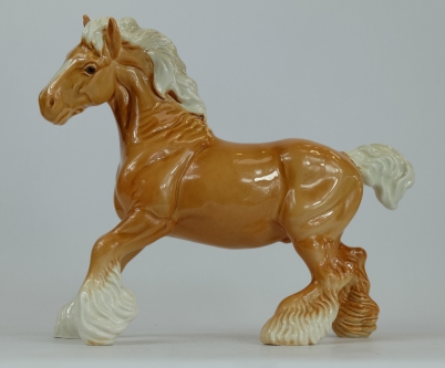 Appraisal: Beswick Palomino cantering Shire horse