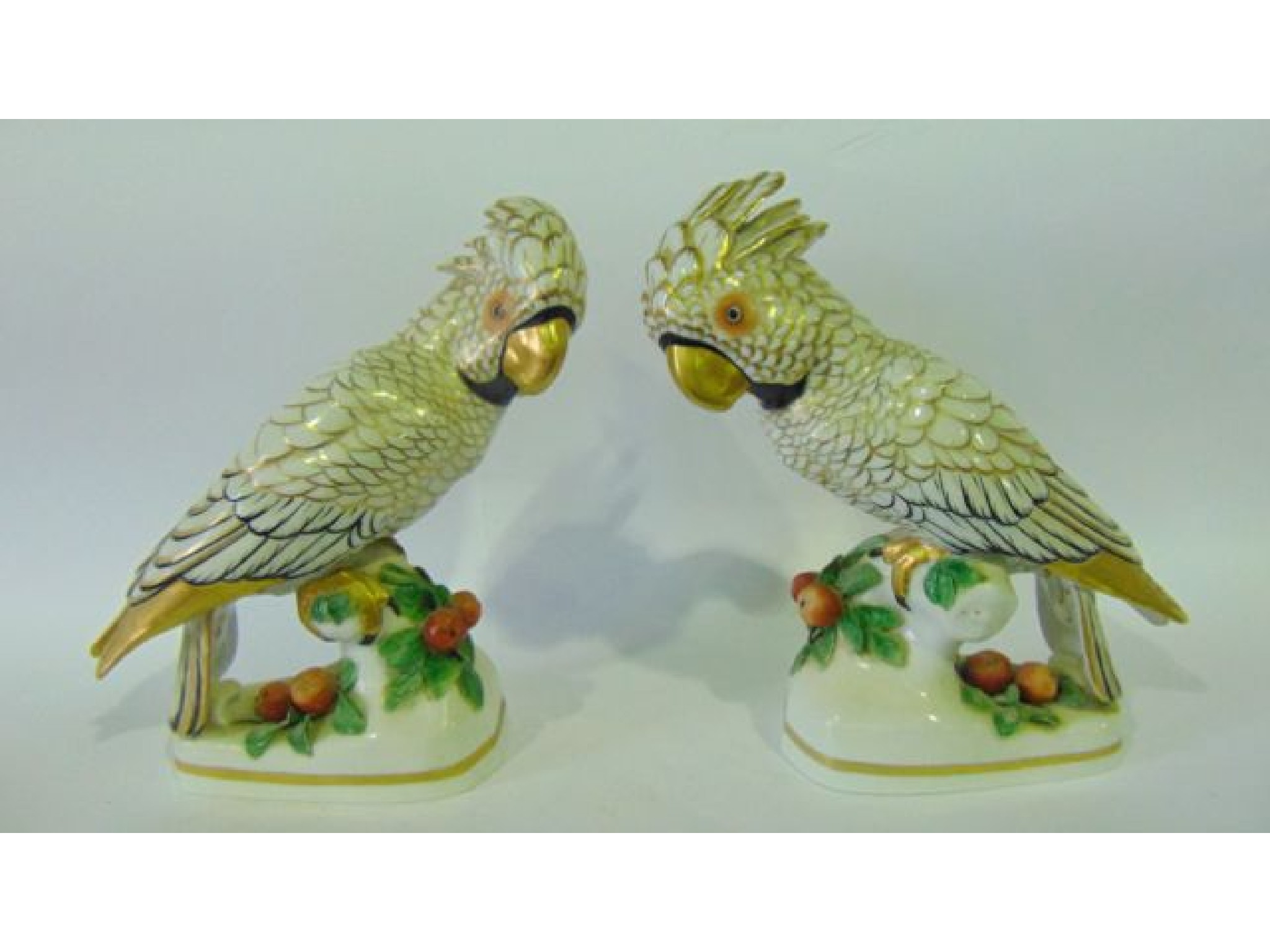 Appraisal: A pair of th century continental models of cockatiels with