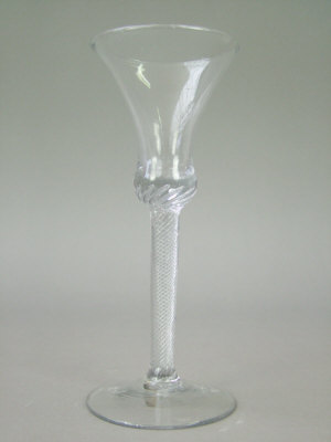 Appraisal: Georgian style wine glass with air twist stem on round